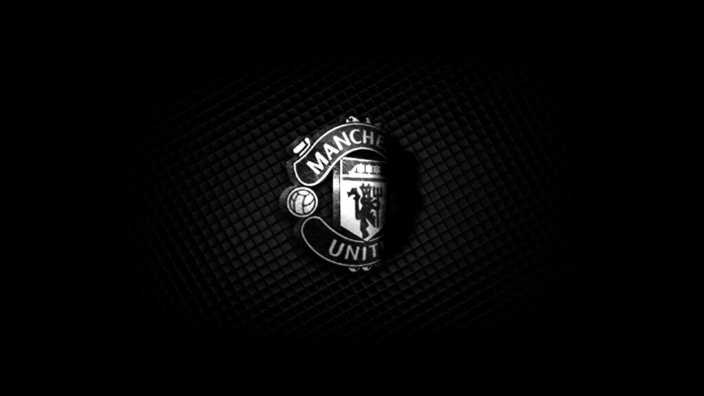 Blackout Glory: A Striking Side View of Manchester United's Iconic Logo on Solid Black Wallpaper in 1080p Full HD 1920x1080 Resolution