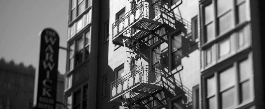 Timeless Black & White San Francisco Wallpaper with Fire Escape