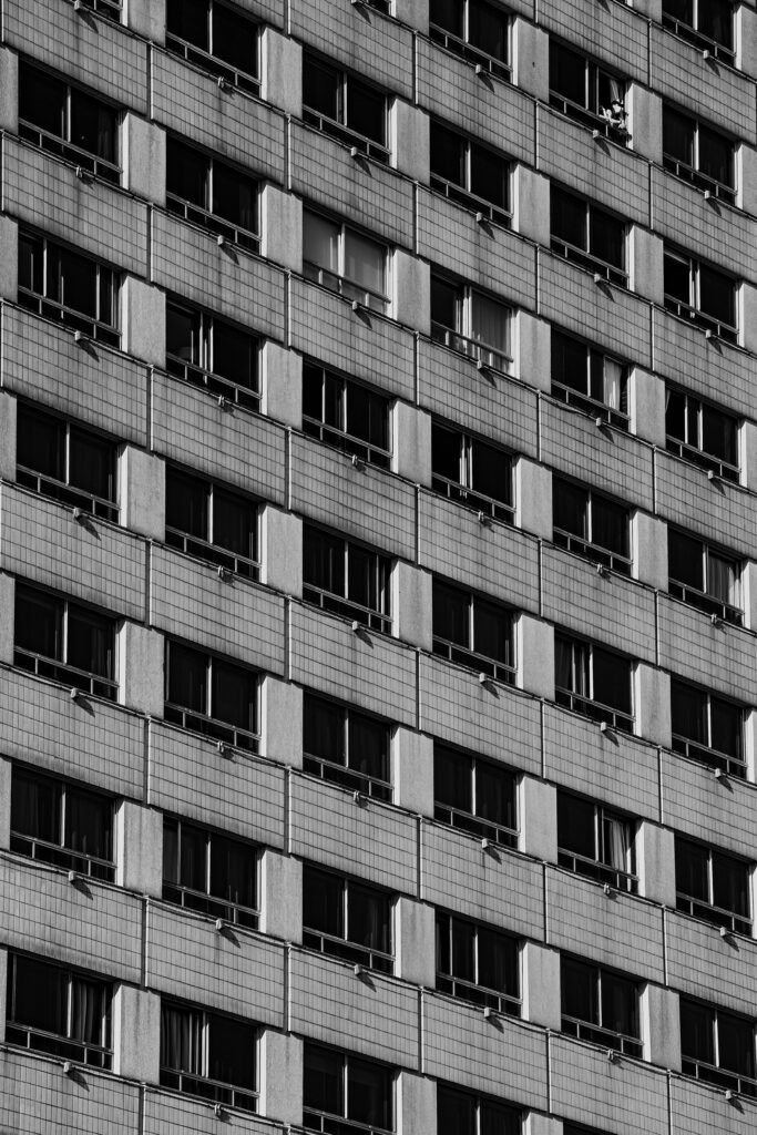 Black and White Building Facade Wallpaper with Grid Pattern Design