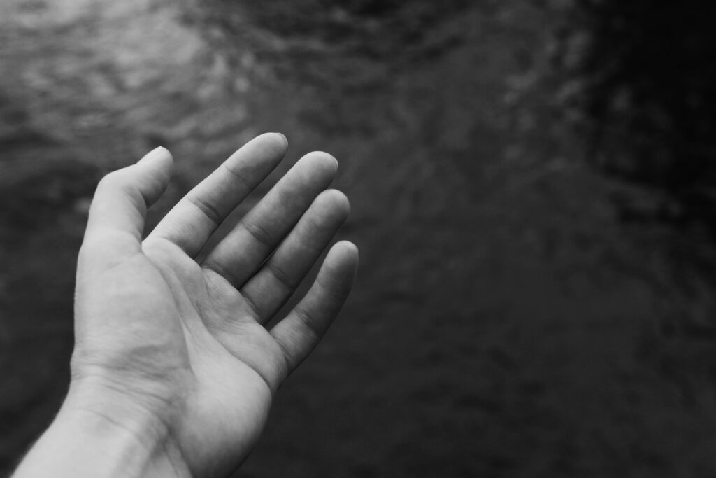 Black and White Wallpaper: Open Hand with Blurred Background