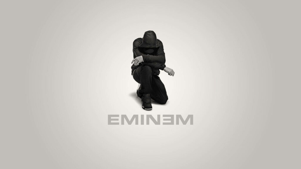 Blackout Eminem: The Intense Kneeling Pose Wallpaper