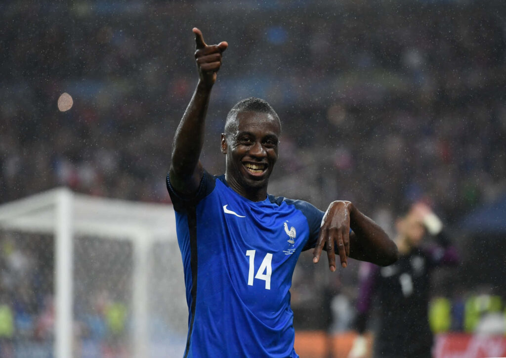 Blaise Matuidi celebrating passionately in France football jersey during intense match wallpaper