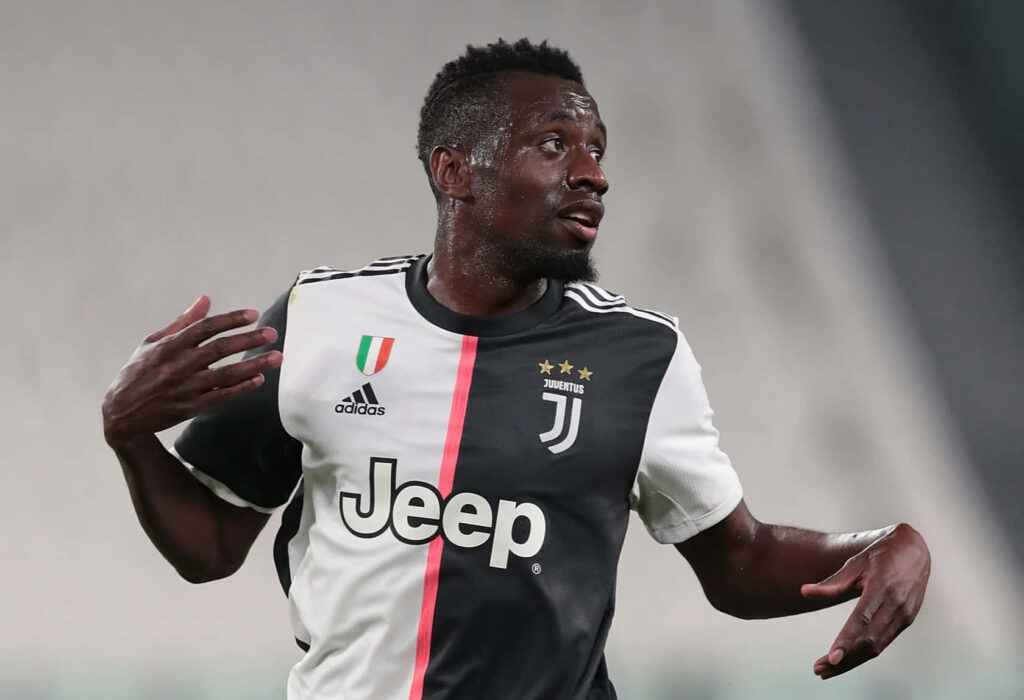 Blaise Matuidi in Juventus jersey playing football on field during match with wallpaper background