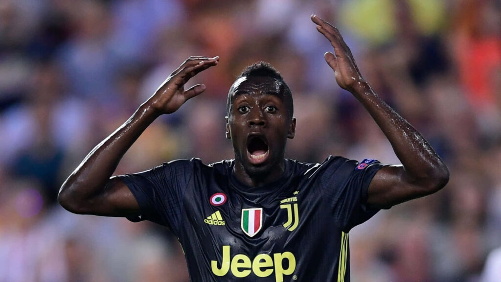 Blaise Matuidi in Juventus jersey showing intense emotion during high-stakes football match Wallpaper