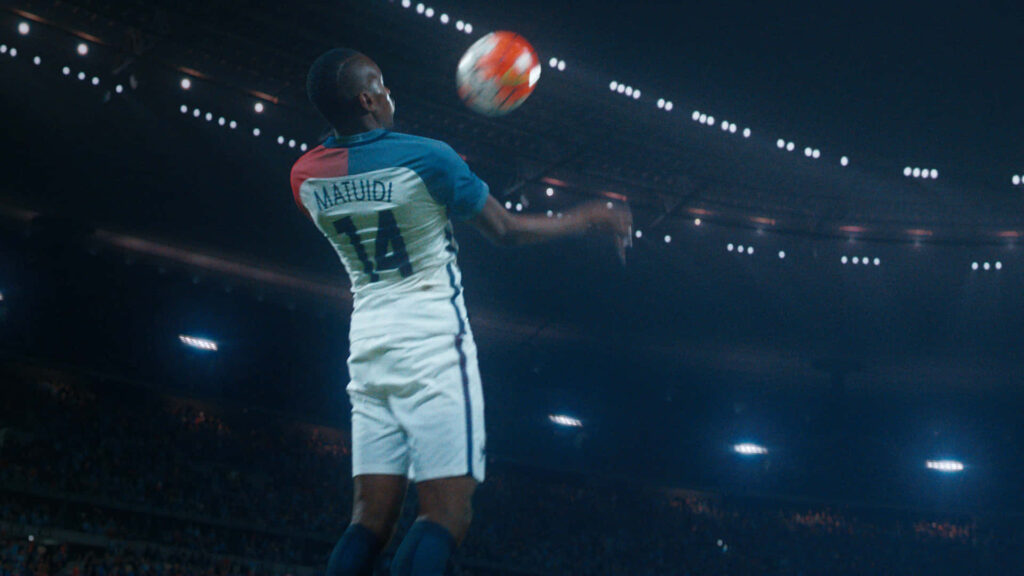 Blaise Matuidi wearing jersey 14 in intense night match at packed stadium action wallpaper background