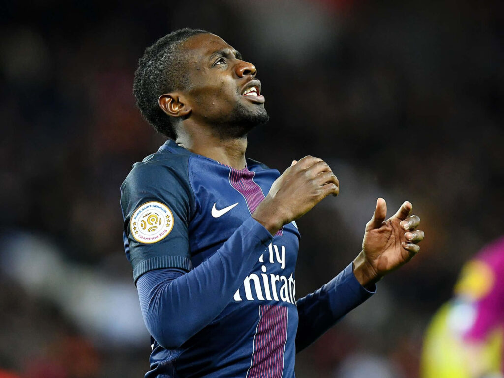 Blaise Matuidi in PSG jersey passionately playing football on field during intense match wallpaper