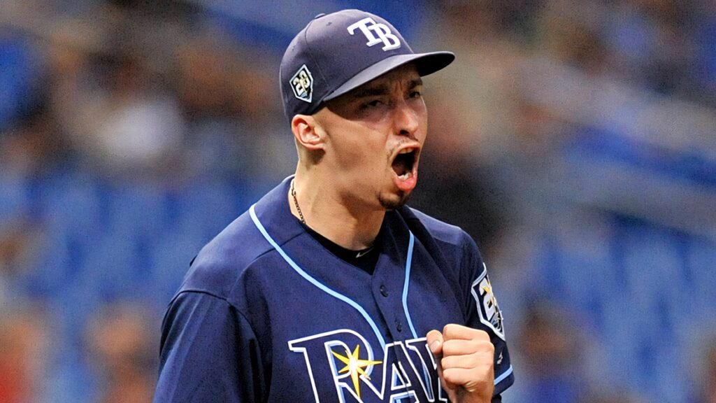 Blake Snell shouts with passion and intensity on the mound in dynamic baseball wallpaper background