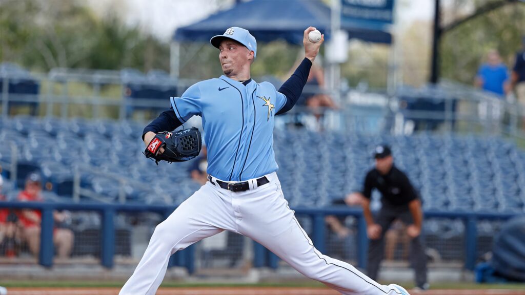 Blake Snell pitching in light blue star jersey dynamic baseball wallpaper stadium background