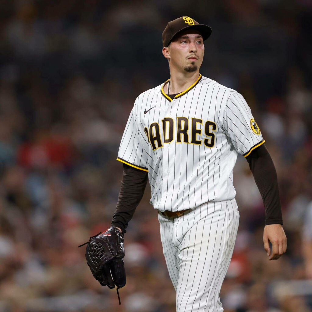 Blake Snell Padres pitcher focused on mound intense baseball wallpaper background image