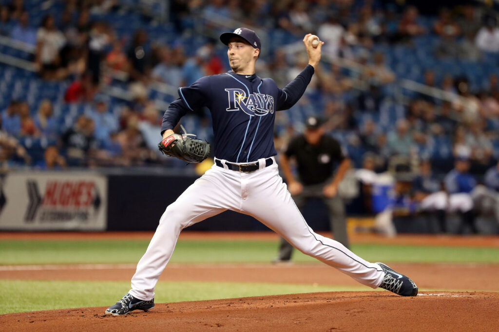 Blake Snell pitching in Tampa Bay Rays uniform during professional baseball game on mound Wallpaper