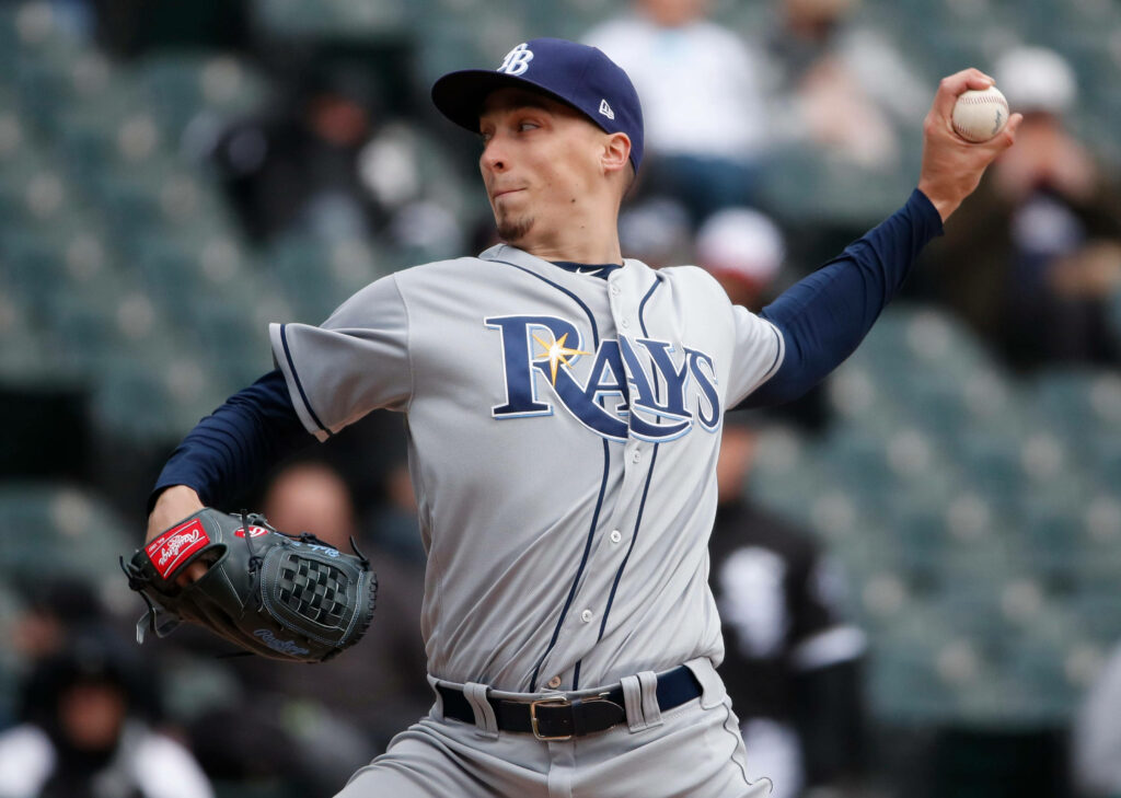 Blake Snell mid-pitch in Tampa Bay Rays grey uniform showing powerful pitching form Wallpaper