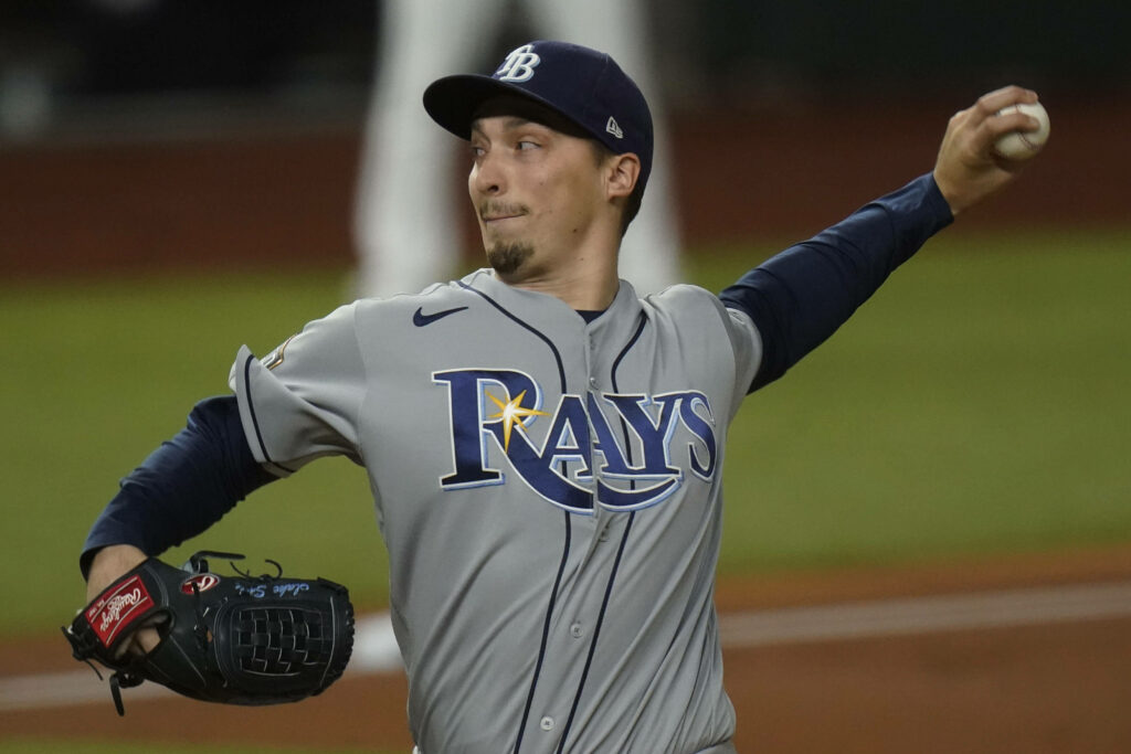 Blake Snell pitching for Tampa Bay Rays in Nike gear dynamic baseball action wallpaper background