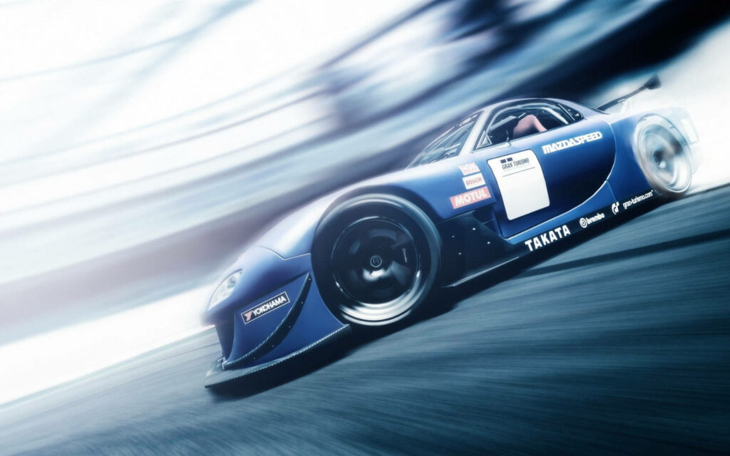 Roaring Reflections: Immersive Rx7 Experience Captured in Blurry Splendor Wallpaper
