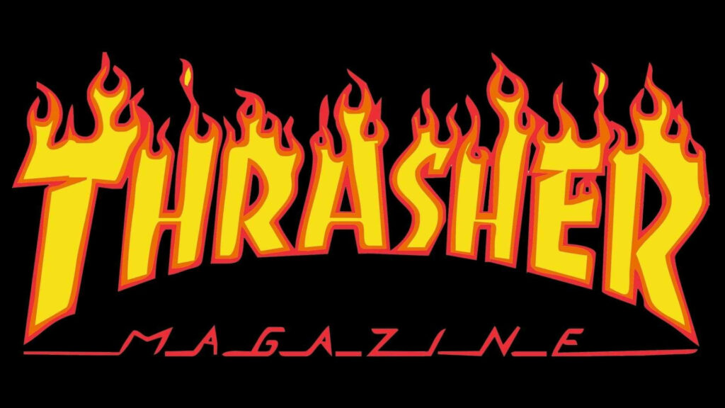 Inferno Brilliance: Thrasher Magazine's Iconic Flaming Logo Embraced in the Enigmatic Darkness Wallpaper