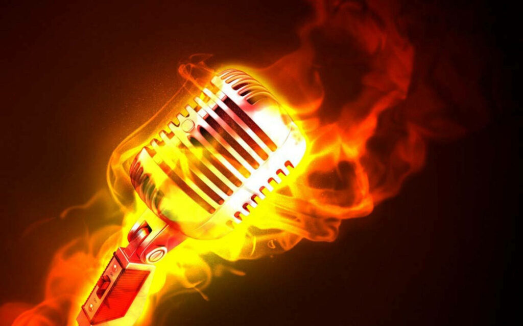 Blazing Silver: Fiery Microphone Ignites a Dark Ambiance Wallpaper