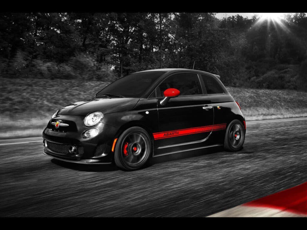 Fierce Velocity: Captivating Abarth Sports Car Dominating the Road Wallpaper