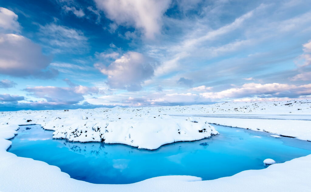 Frozen Majesty: A 4K Winter Nature Ultra Background Photo of Blue River Scenery Wallpaper