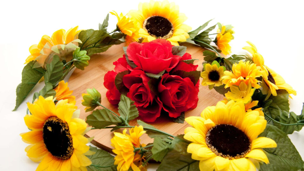 Blooming Beauty: A Radiant Floral Crown of Sunflowers and Roses - Enchanting Sunflowers and Roses Background Wallpaper