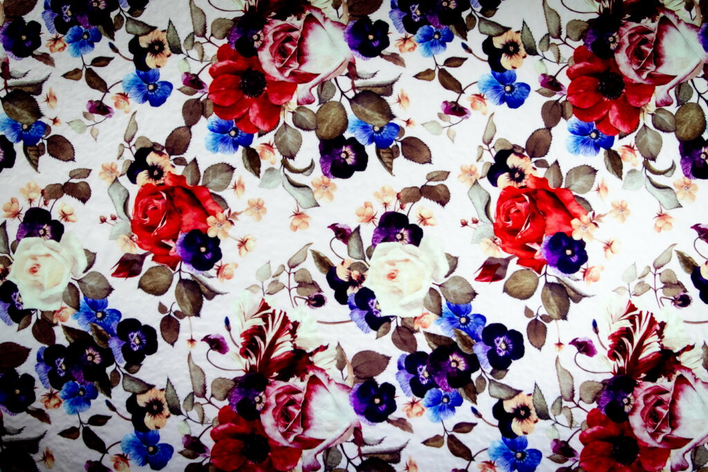 Blooming in Tricolor: A Vibrant Floral Textile Delight Wallpaper