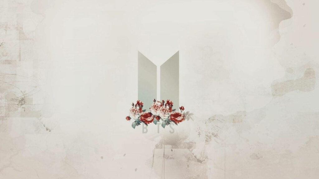 Blossoming Harmony: BTS Logo Enveloped in Nature's Beauty on a Whimsical Laptop Background Wallpaper
