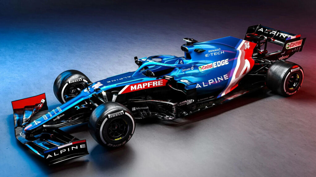 Blue Alpine race car with aerodynamic design and dynamic sponsor graphics under dramatic light Wallpaper