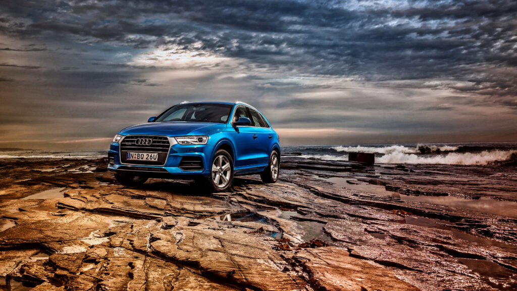Blue Audi Q3 TFSI Quattro: Stunning Seascape Adventure Wallpaper