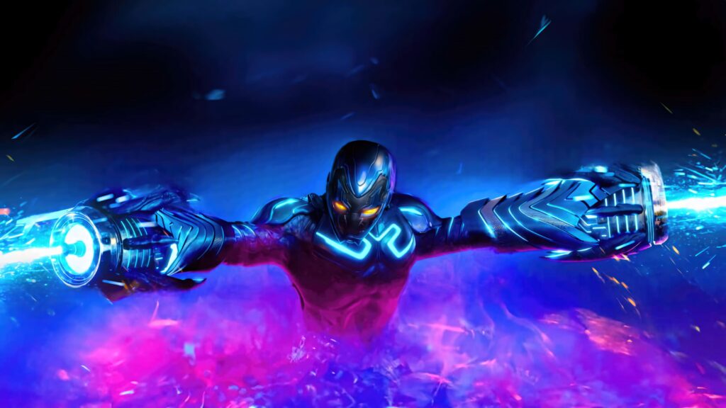 Blue Beetle in glowing blue armor with energy weapons and vibrant neon light effects wallpaper