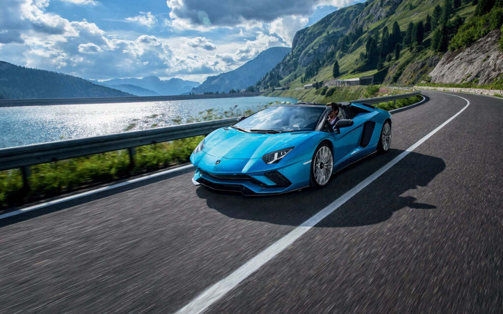 Lustrous Blue Beauty: A Captivating Backdrop Featuring a Lamborghini Aventador Sports Car Wallpaper