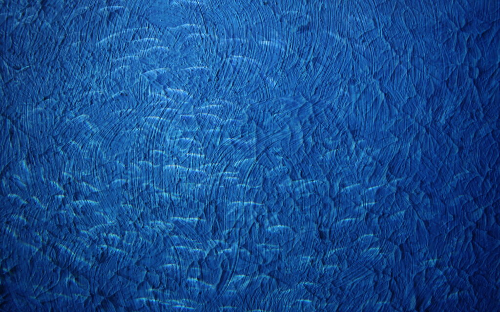 Serene Blue Canvas: A Captivating QHD Wallpaper of Textured Stone and Strokes of Paint