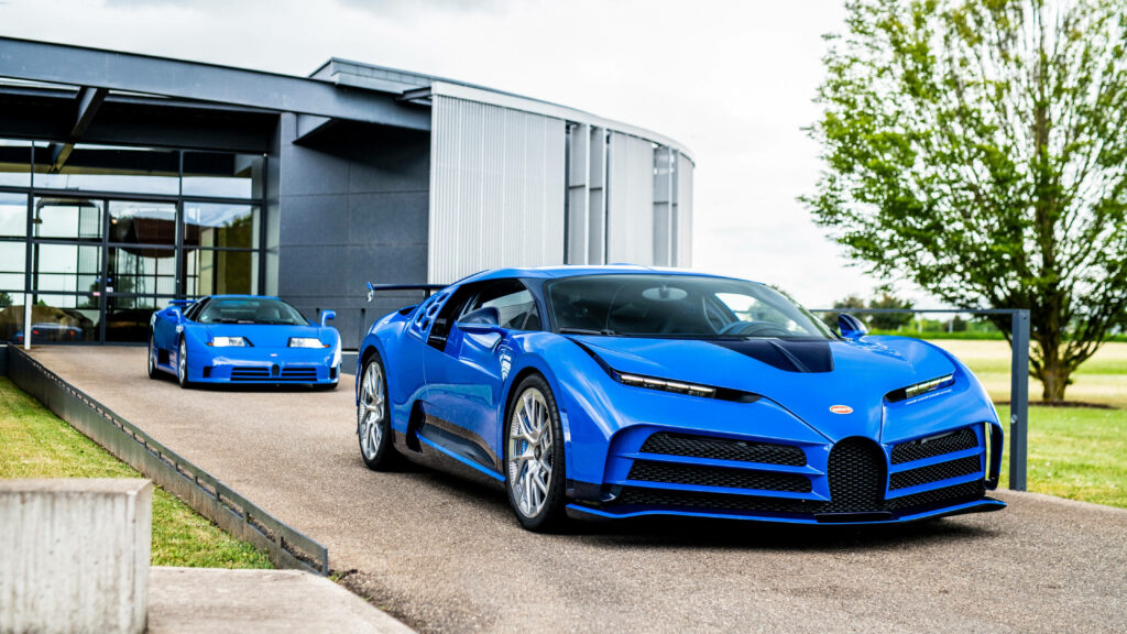Blue Bugatti car parked outside modern building with another Bugatti in background high resolution Wallpaper