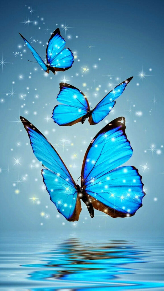 Blue Butterfly Trio: A Radiant Mobile Wallpaper of Shimmering Wings Above Water