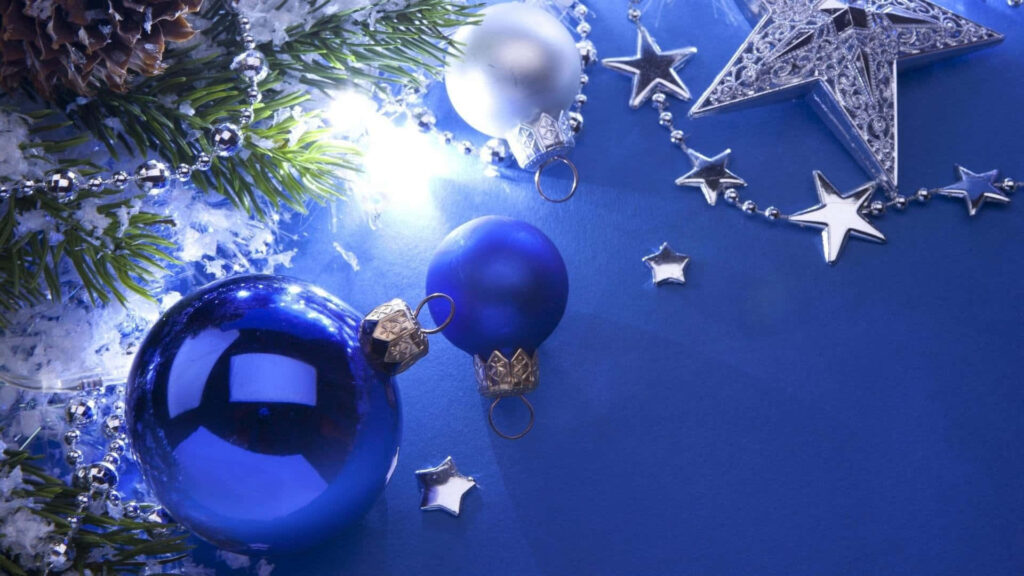Blissful Blue Delight: A Festive Arrangement of Christmas Adornments on a Serene Background Wallpaper