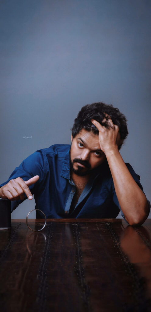 Ruggedly Stylish: Master Vijay's Hd Wallpaper with Blue Polo and Ring