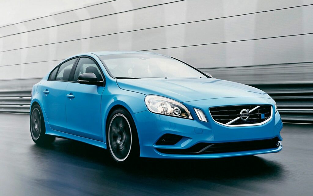 Sleek Blue Volvo Concept Car in Motion - Modern Wallpaper