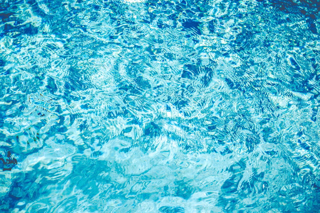 Serene Blue Water: Mesmerizing Ripples in an Exquisite 5K Texture Wallpaper