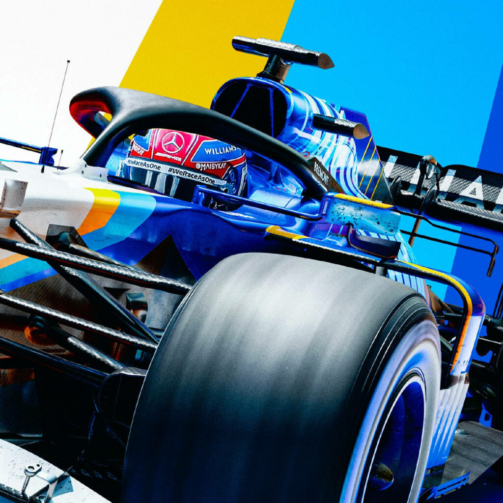 Close-up of blue Williams racing car with dynamic design on vivid yellow and blue background wallpaper