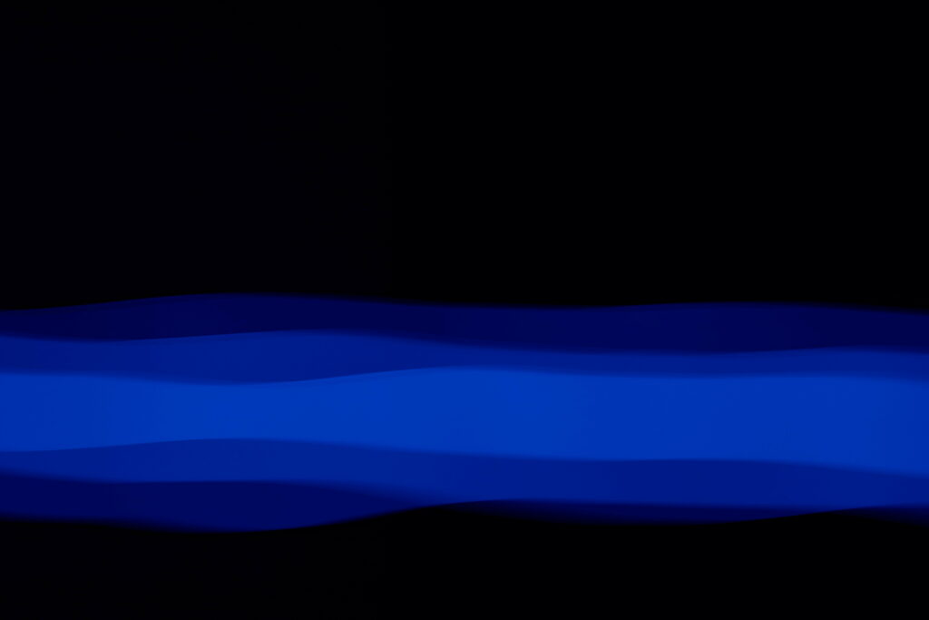 Symmetrical Stripes: A Mesmerizing Blue and Black HD Wallpaper Background