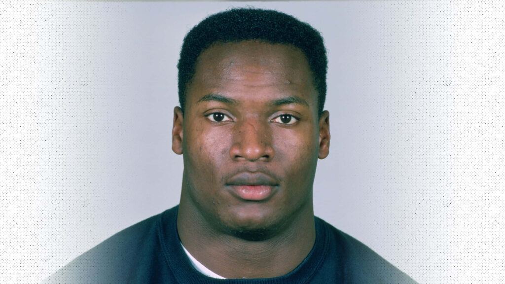 Bo Jackson buzz cut intense gaze classic portrait athletic presence simple wallpaper background