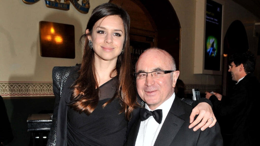 Bob Hoskins and daughter Rosa Hoskins dressed elegantly smiling warmly at formal event background Wallpaper