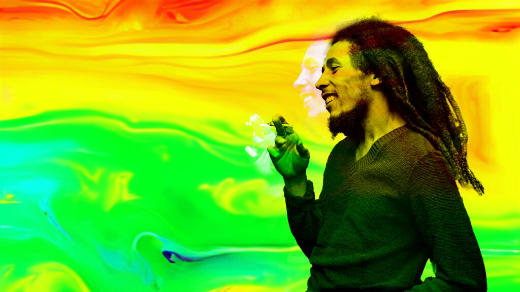 Bob Marley reggae wallpaper with vibrant red yellow green swirling background reflecting Rastafarian culture