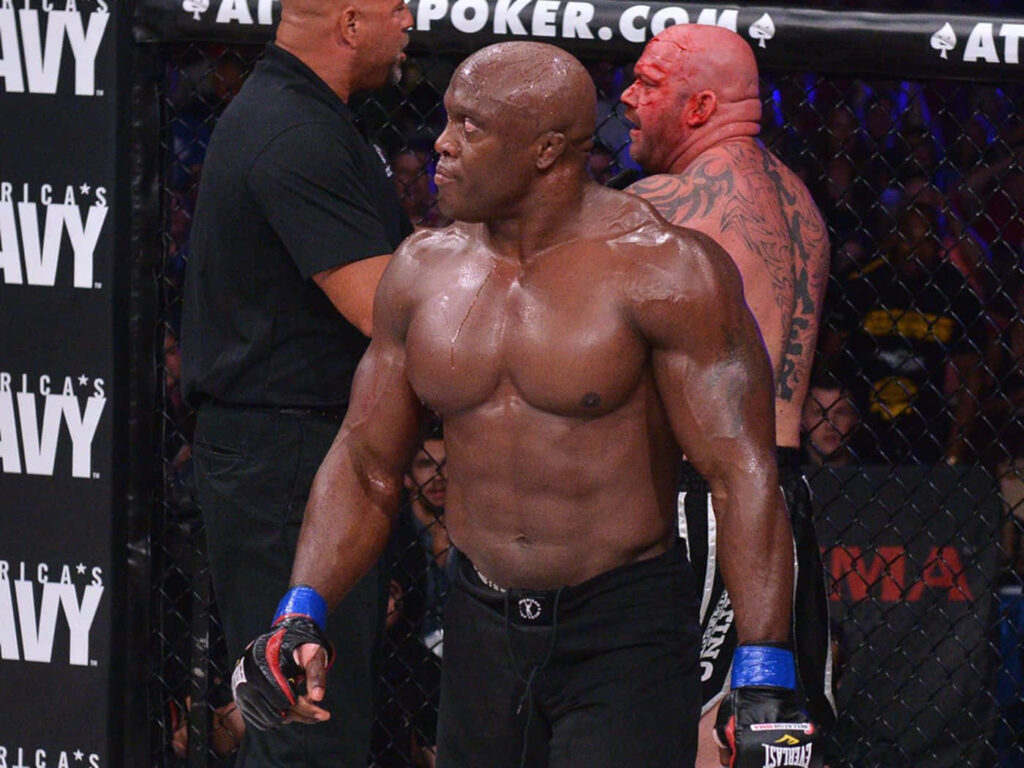 Bobby Lashley intense focus and muscular physique during a live wrestling match arena wallpaper