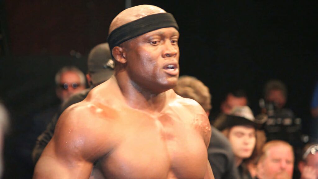 Bobby Lashley in ring wearing black headband showing powerful focused intense wrestling match Wallpaper