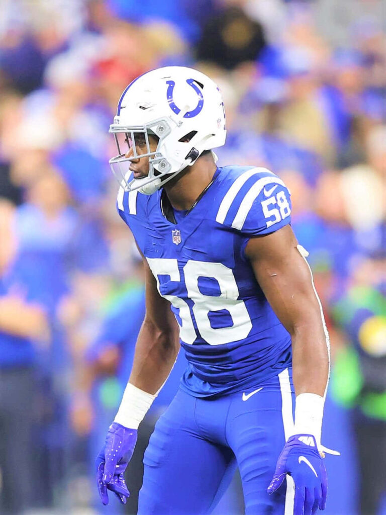 Bobby Okereke in Indianapolis Colts uniform focused during game action on football field wallpaper