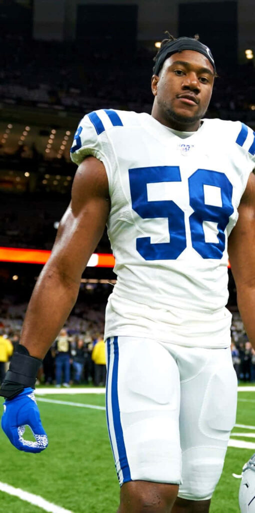 Bobby Okereke linebacker in Indianapolis Colts uniform on field ready for game time action wallpaper
