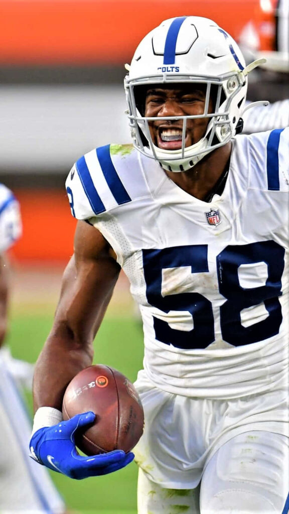 Bobby Okereke Indianapolis Colts linebacker intense game action athleticism wallpaper background