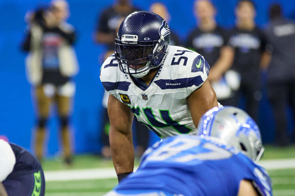 Bobby Wagner focused linebacker ready for action dynamic football wallpaper background image