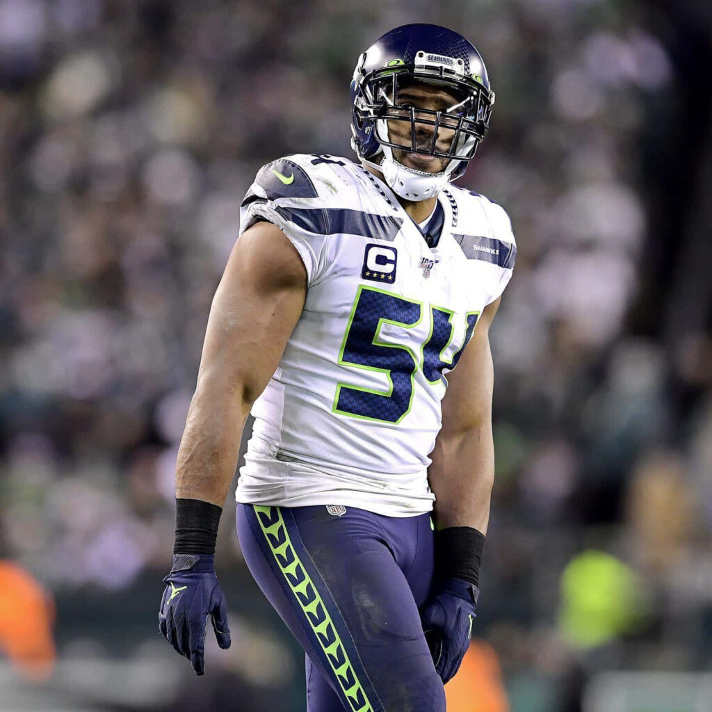 Bobby Wagner Seattle Seahawks linebacker number 54 in action football field wallpaper background