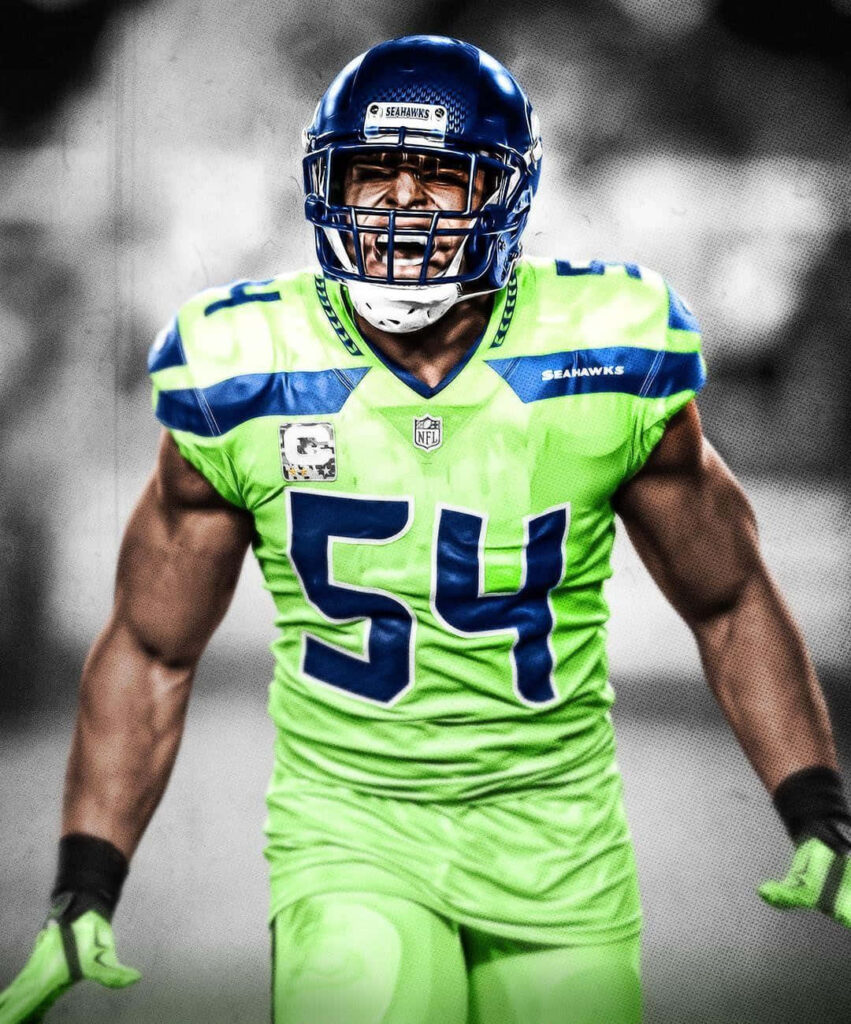 Bobby Wagner Seattle Seahawks number 54 intense football stance powerful on field wallpaper