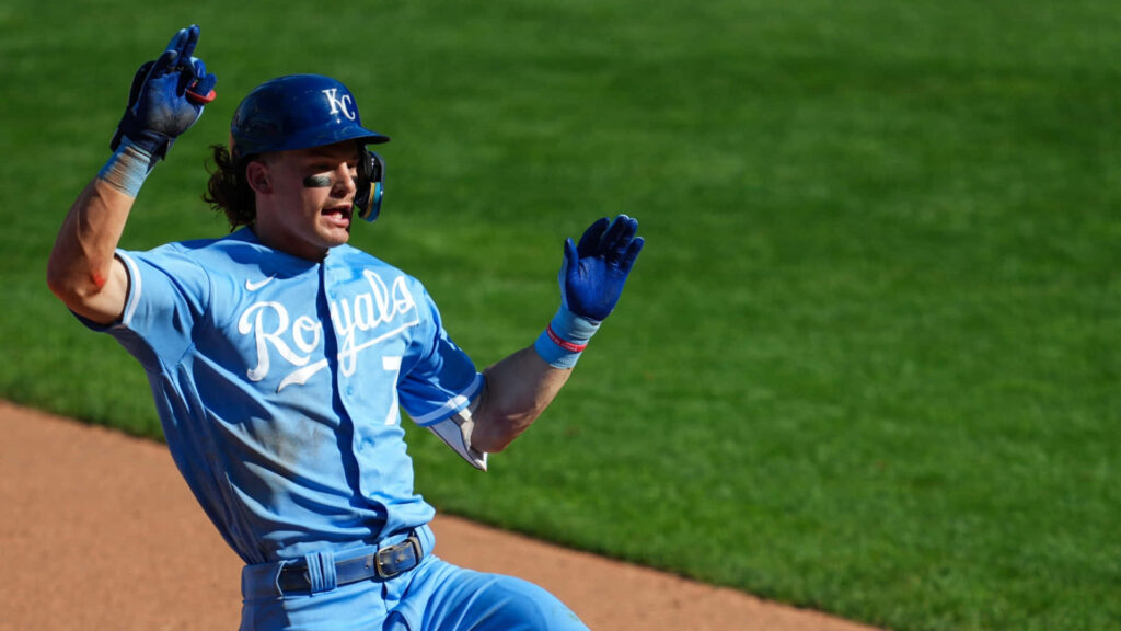 Bobby Witt Jr celebrating exciting baseball moment in Kansas City Royals uniform wallpaper background
