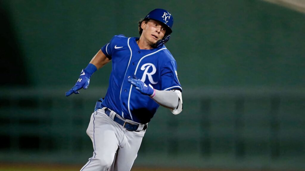 Bobby Witt Jr sprinting in blue Kansas City Royals uniform during baseball game action Wallpaper